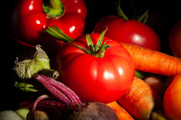 tomato vegetable mix on black background