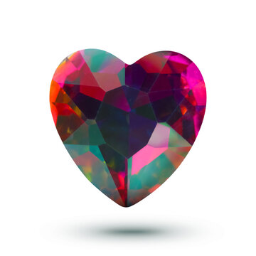 Colorful heart shaped shiny gemstone in air on white background