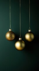 Elegant Christmas tree ornaments hanging on a minimal dark green backdrop, leaving space for personalized greetings.