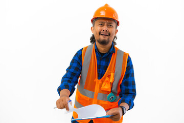 Indonesian male construction worker using safety gear excited posing using clipboard, construction and industry concept, isolated on white background.