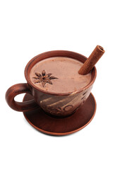 Hot chocolate or cocoa drink in a brown clay cup with cinnamon stick and star anise isolated on transparent background