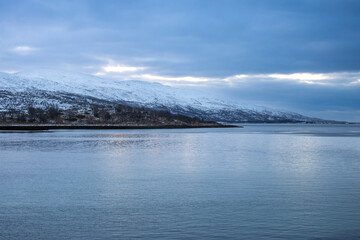 Winter landscape with ocean and mountains, Norway