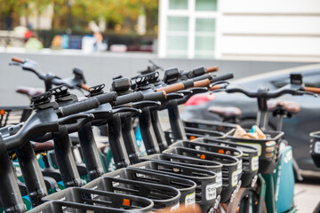Lines of bicycles for hire in central London.