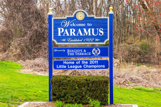 Paramus welcome sign established in 1922, celebrating 2011 Little League champions, surrounded by spring greenery. New Jersey, USA. 