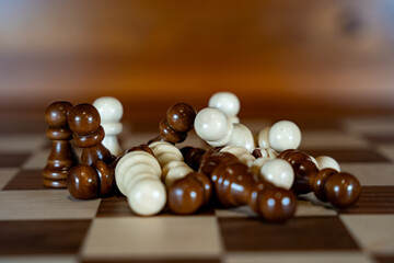 Stacked pawns on the board of the chess game.
