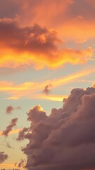 Colorful clouds streaking across a luminous sky at sunset, abstract