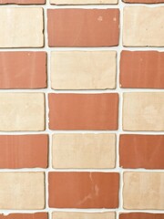 Fototapeta premium Ceramic brick tile wall with rustic texture and earthy tones, architecture