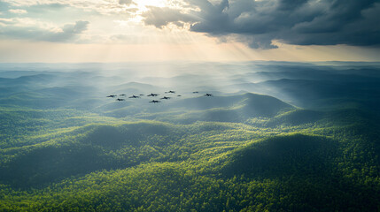 A formation of fighter jets flying over a vast green forest with sunlight piercing through clouds.