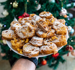 Authentic sweet Christmas French toast served with sugar and cinnamon in a Christmas atmosphere