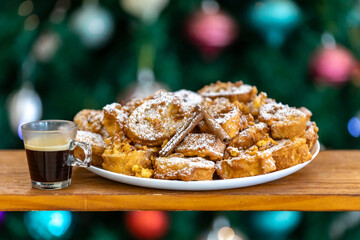 Authentic sweet Christmas French toast served with sugar and cinnamon in a Christmas atmosphere