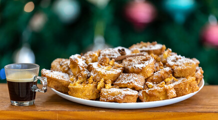 Authentic sweet Christmas French toast served with sugar and cinnamon in a Christmas atmosphere