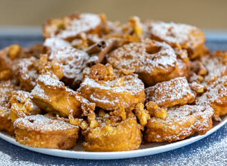 Authentic sweet Christmas French toast served with sugar and cinnamon in a Christmas atmosphere