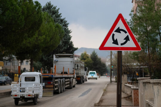 Roundabout road sign on the street.
