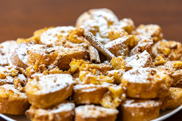 Authentic sweet Christmas French toast served with sugar and cinnamon in a Christmas atmosphere