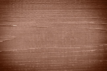Fototapeta premium The texture of a wooden surface close-up. Demonstrating color of 2025 year mocha mousse