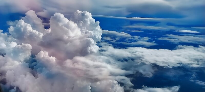 Aerial view of beautiful cloudscape with blue sky and white clouds.