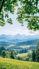 Scenic Summer Landscape, Rolling Green Hills, Majestic Mountains and Lush Forest Under Blue Sky