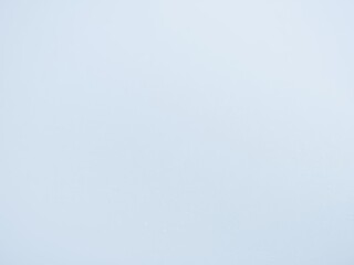 Fototapeta premium Freshly fallen snow creating a soft and smooth textured background for winter scenes, frozen, icy