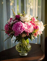 Elegant Vase of Roses and Peonies in Bloom