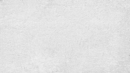 A gray wall with a white paint. The wall is very plain and has no decorations. The wall is made of concrete. white gray texture background for template, page or web banner