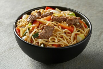 A bowl of noodles filled with sliced meat and mixed vegetables
