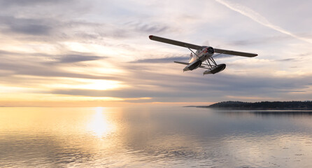 Scenic Seaplane Flying Over Tranquil Waters at Sunset on Vancouver Island