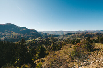 beautiful autumn afternoon in mountains. wonderful countryside of romania on a sunny weather in evening
