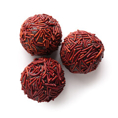 Delicious chocolate truffles on white background