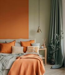 This inviting bedroom showcases a blend of orange and green hues on the walls.