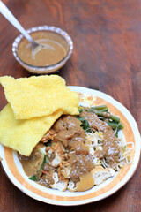 Rujak Petis Cingur, East Java Favorite Street Food Made from Boiled Vegetable with Lontong and Kikil