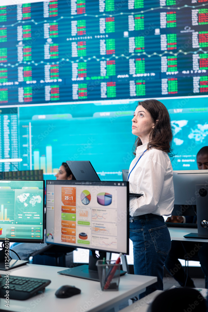 Poster business operator gathering insight on key performance indicators for shareholders, communicating or
