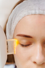 IPL face pigmentation therapy by beautician. Ultrasound laser facial pigmentation treatment in...