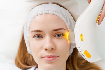 Ultrasound laser facial pigmentation treatment in medicine center. IPL face pigmentation therapy by...