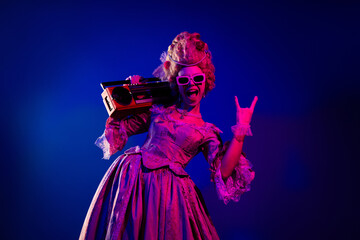 Photo of pretty funky lady dressed pompous rococo costume sunglass showing hard rock sign enjoy...