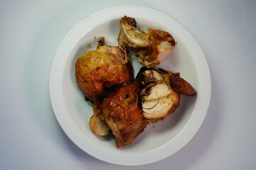 Grilled chicken cut into pieces, ready to eat