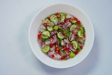 Vinegar with sugar, cucumber, shallots and chili, ready to eat.