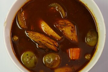 A local food in southern Thailand is fish entrail curry.