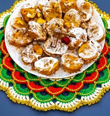 Authentic sweet Christmas French toast served with sugar and cinnamon in a Christmas atmosphere