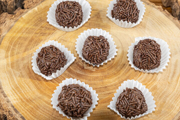 Brazilian chocolate truffle on wooden plates. Traditional Brazilian sweet_2.