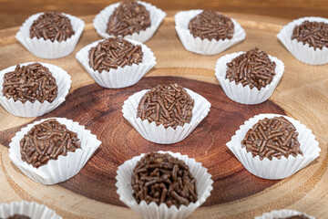 Brazilian chocolate truffle on wooden plates. Traditional Brazilian sweet_8.