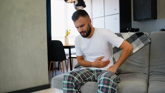 Funny man suddenly felt pain in his stomach