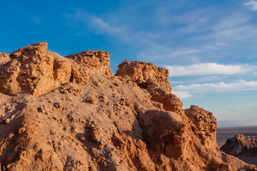 Valle de la Luna in San Pedro de Atacama desert, Chile. The Moon valley or Valley of the Moon arid soil and red rock landscape in Atacama desert