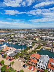 Waterfront homes along a canal in Newport beach in Orange County, Southern California