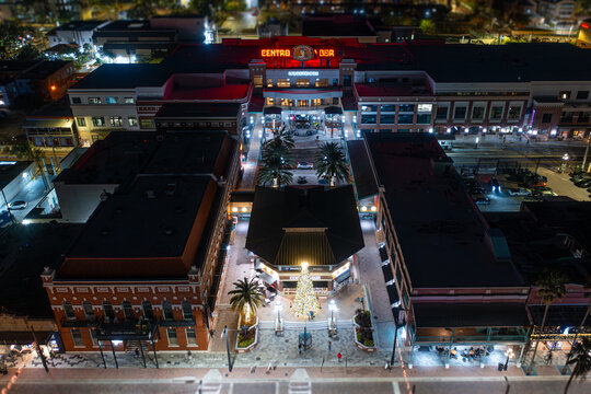 Muvico Theaters, Ybor City, Tampa Florida, USA - 12/24/2024: 

Nighttime aerial shot of Ybor City and the Muvico Centro Ybor 20 Theaters.