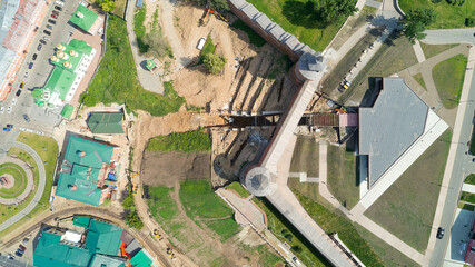 City park with a large building in the background