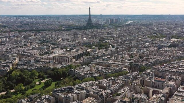 PARIS, FRANCE - OCTOBER 3, 2024: Stunning aerial view captures the architectural beauty and landscape of central Paris including the Eiffel Tower