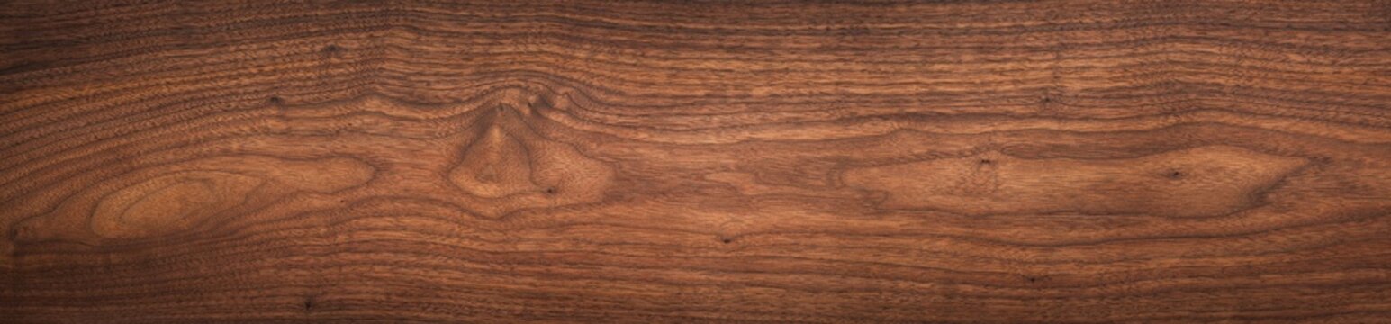 Walnut wood texture. Super long walnut planks texture background.Texture element.	
