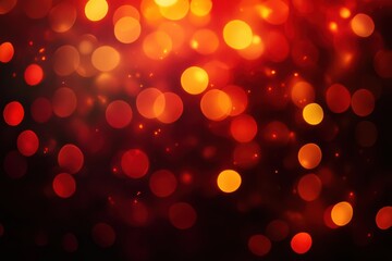 Fototapeta premium A vibrant abstract background featuring glowing red and orange bokeh lights.