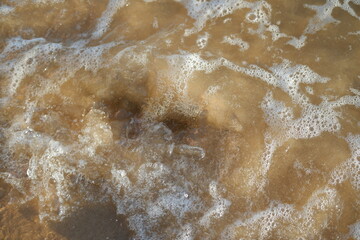 sea surf wave on the beach, closeup of photo, nature series