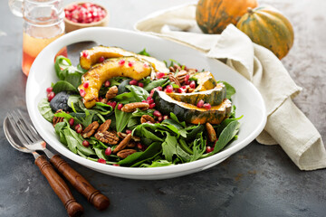 Fall salad with greens and acorn squash